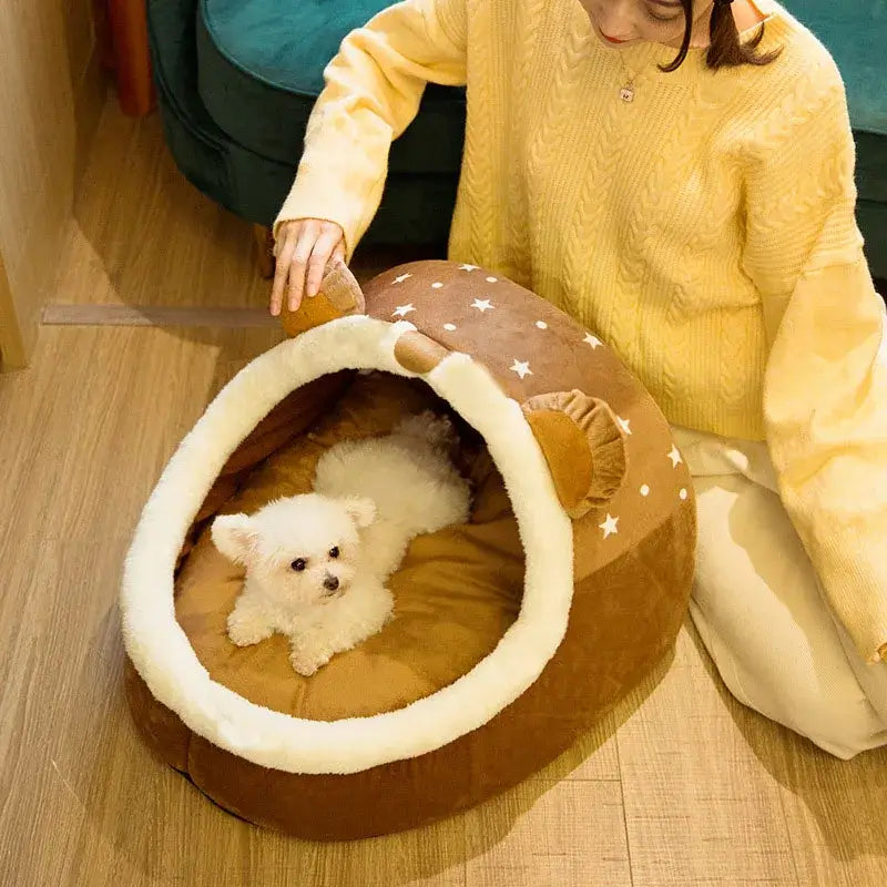 Cozy foldable pet house with a small dog inside, perfect for home and travel comfort.