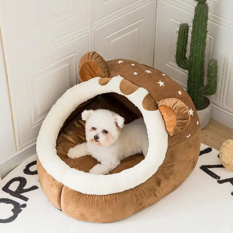 Cozy foldable pet house with a small dog inside, featuring a bear design and soft fabric for comfort.