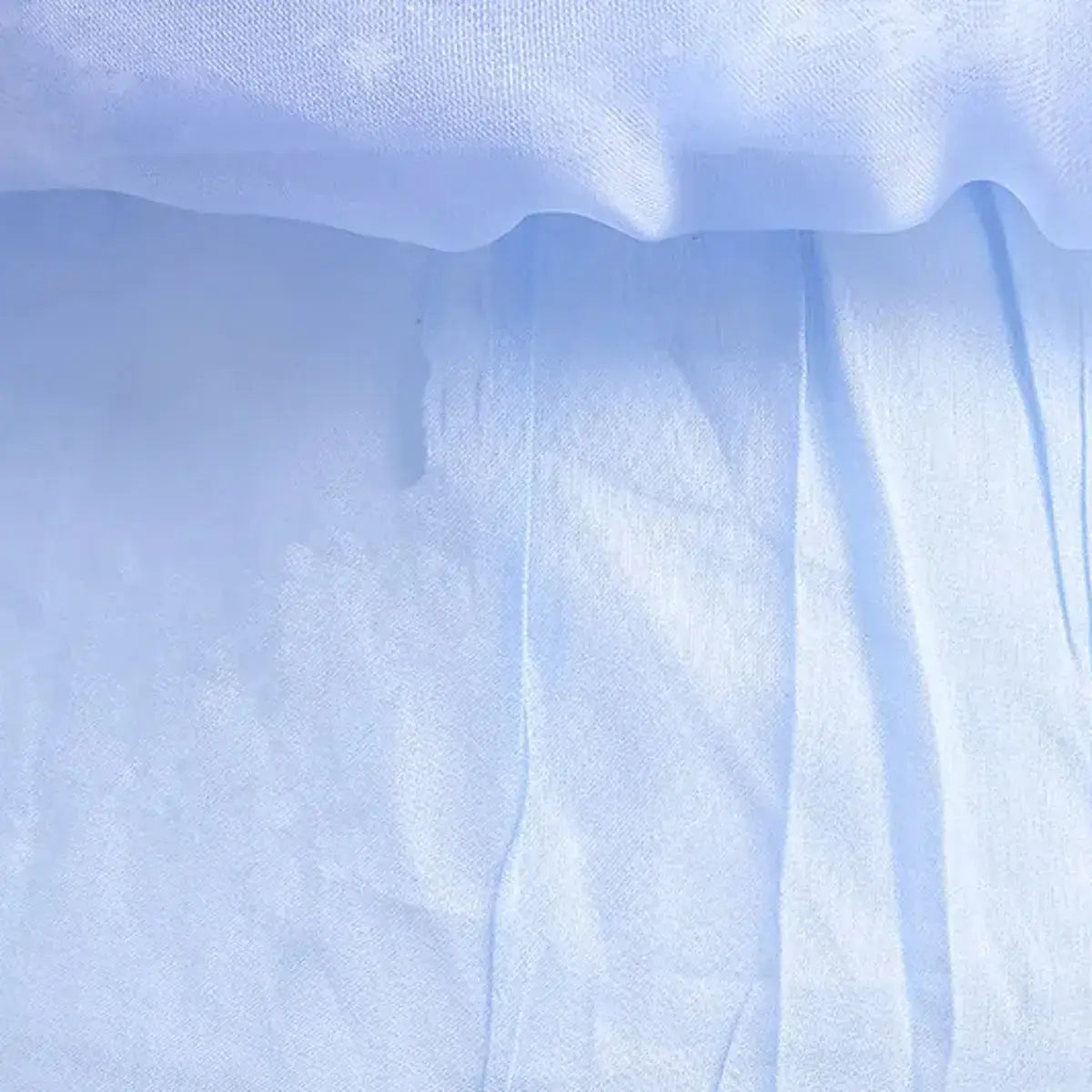 Light blue fabric featuring a soft, flowing texture, ideal for creating a Disney Elsa costume for kids.