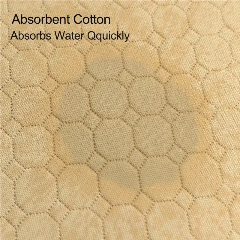 Absorbent cotton fabric with hexagonal quilted pattern for quick water absorption.