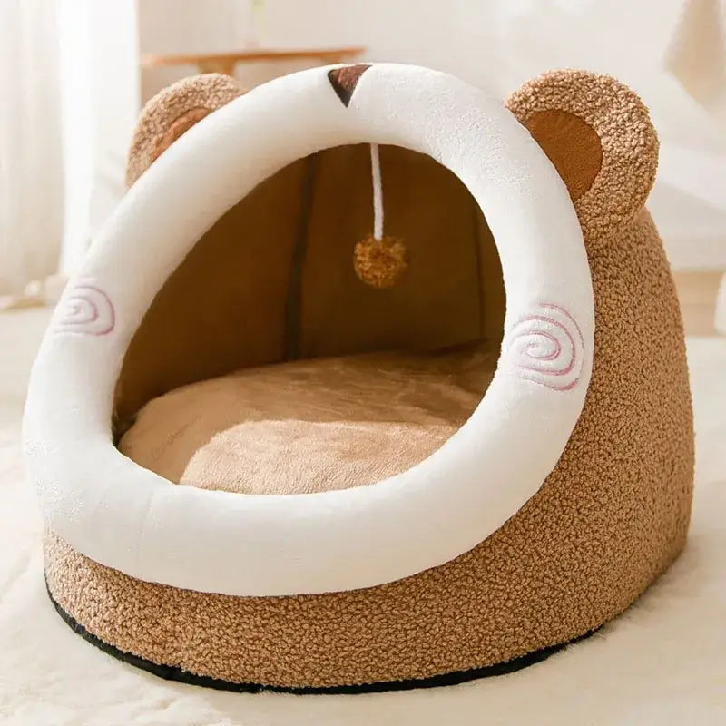 Cozy foldable pet house designed like a bear, providing a secure retreat for small dogs and cats. Perfect for relaxation.