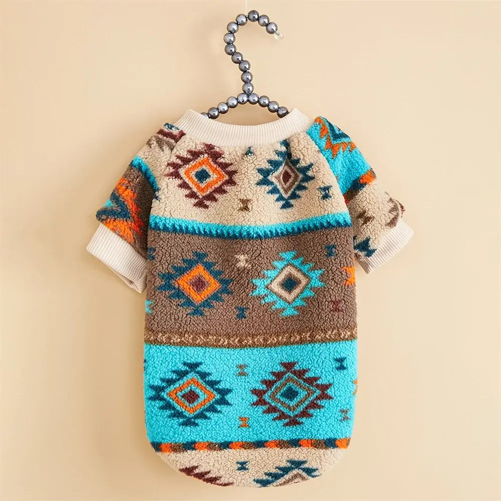 Cute woolen pullover sweater for small dogs in vibrant tribal pattern, perfect for chilly weather.