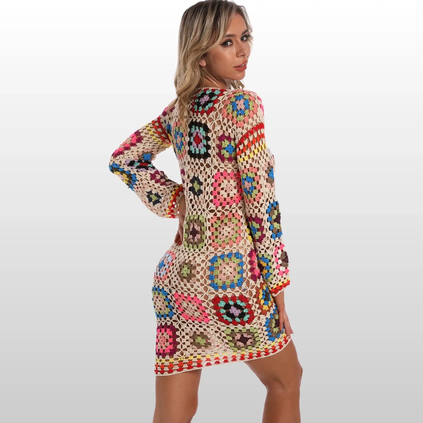 Handmade boho crochet dress featuring colorful granny square design and long sleeves, perfect for summer and beach weddings.