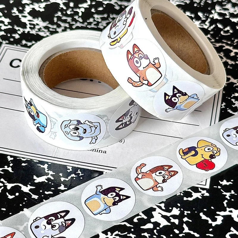 Bluey Bingo Dog Stickers, 500 pcs roll, featuring characters on durable paper for kids' crafts and decoration, on a notebook background.