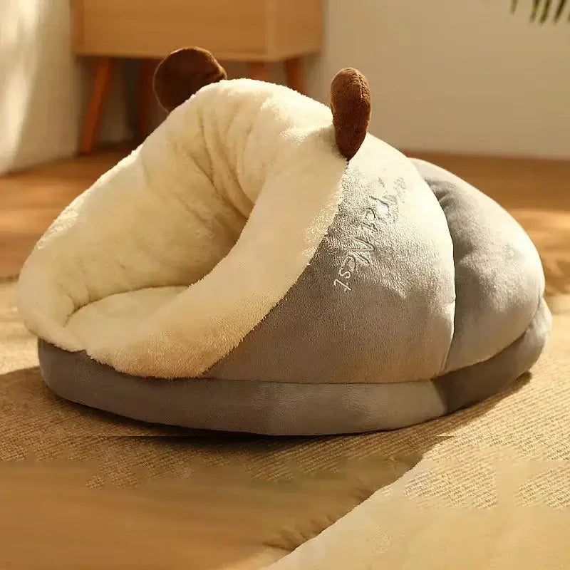 Cozy slipper-shaped pet bed for small dogs and cats, featuring soft fabric and playful design for comfort.