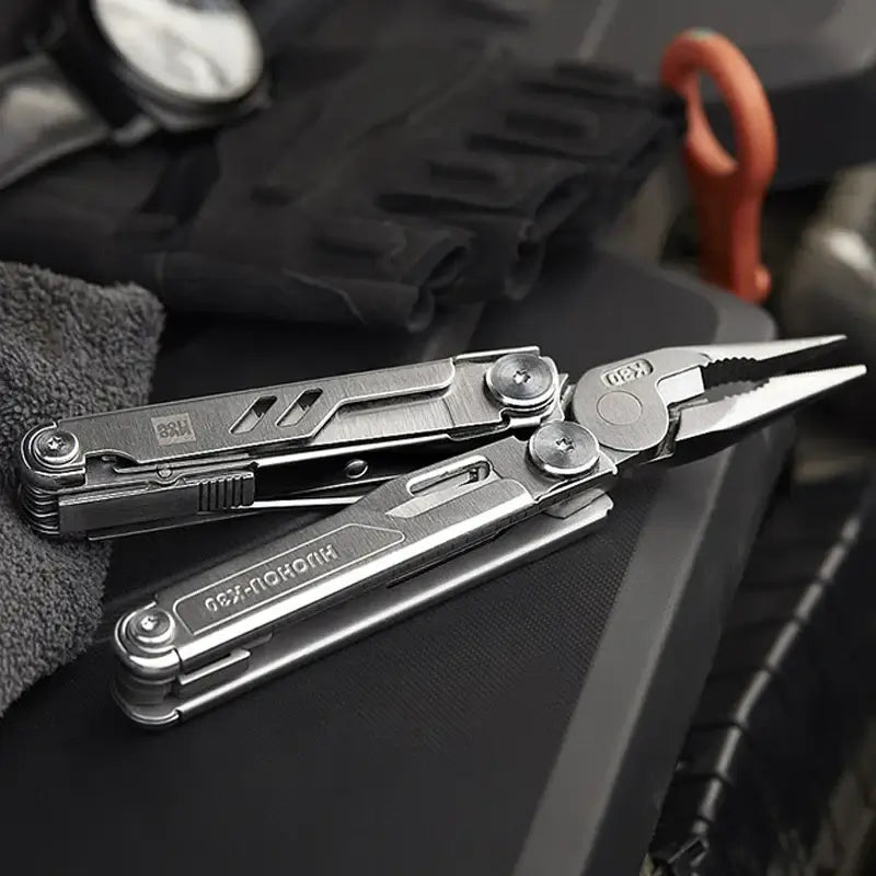 Precision 18-in-1 multitool folding knife with pliers, chrome steel design, perfect for emergencies and outdoor tasks.