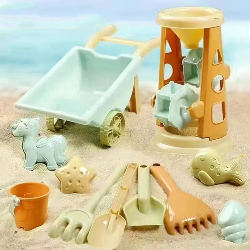 Colorful children's beach sand toys set with a cart, molds, and shovels on sand, perfect for summer fun and creativity.