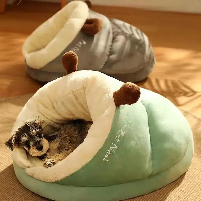 Cozy cat nest and small dog bed in playful slipper shape with a puppy inside, perfect for comfort and style.