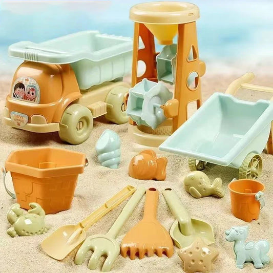 Children's beach toy set with colorful trucks, sand molds, and shovels on the sand, perfect for summer fun and creative play.