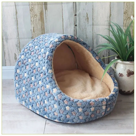 Cozy small pet nest in blue plush fabric, perfect for small dogs and cats to relax and unwind.